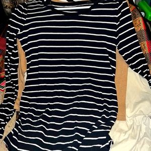 A small but fits med to large bump maternity shirt